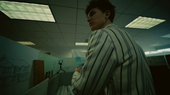 Movie still from “Gus Dapperton - Palms feat. Channel Tres” (2021), directed by Kevin Lombardo – Medium shot, Low angle