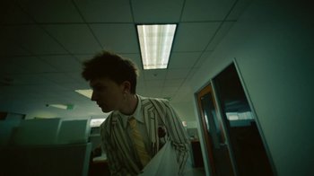 Movie still from “Gus Dapperton - Palms feat. Channel Tres” (2021), directed by Kevin Lombardo – Medium shot, High angle