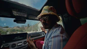 Movie still from “Gus Dapperton - Palms feat. Channel Tres” (2021), directed by Kevin Lombardo – Medium shot, Low angle