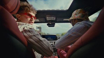 Movie still from “Gus Dapperton - Palms feat. Channel Tres” (2021), directed by Kevin Lombardo – Medium shot, Low angle