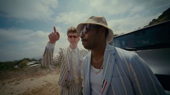 Movie still from “Gus Dapperton - Palms feat. Channel Tres” (2021), directed by Kevin Lombardo – Medium shot, Low angle