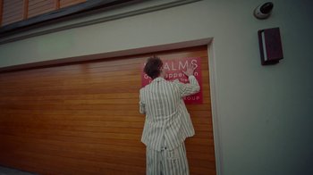 Movie still from “Gus Dapperton - Palms feat. Channel Tres” (2021), directed by Kevin Lombardo – Medium shot, Low angle
