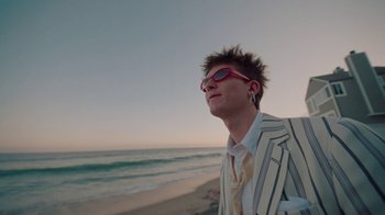 Movie still from “Gus Dapperton - Palms feat. Channel Tres” (2021), directed by Kevin Lombardo – Medium shot, Low angle