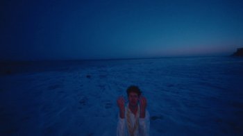 Movie still from “Gus Dapperton - Palms feat. Channel Tres” (2021), directed by Kevin Lombardo – Wide shot, Overhead angle