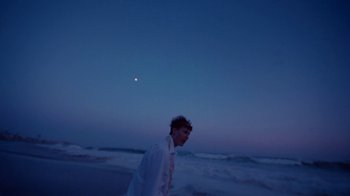 Movie still from “Gus Dapperton - Palms feat. Channel Tres” (2021), directed by Kevin Lombardo – Wide shot, Low angle