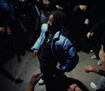 Movie still from “Snipes x Nike - The Cypher” (2023) – Medium shot, Low angle