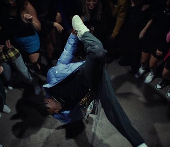 Movie still from “Snipes x Nike - The Cypher” (2023) – Medium shot, Overhead angle