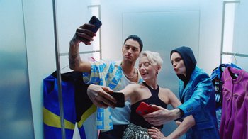 Movie still from “Halfprice - Fitting room” (2022) – Medium shot, Overhead angle