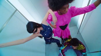 Movie still from “Halfprice - Fitting room” (2022) – Wide shot, Overhead angle