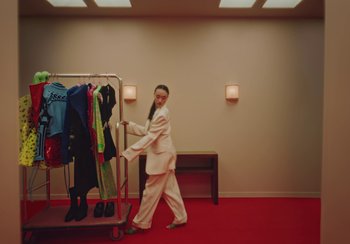 Movie still from “H&M - House of Members” (2023) – Wide shot, Low angle