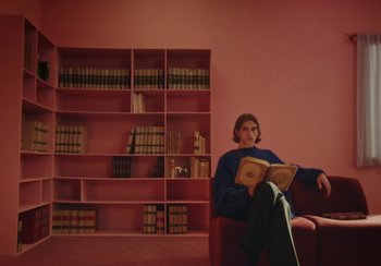 Movie still from “H&M - House of Members” (2023) – Wide shot, Low angle
