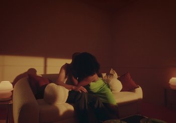 Movie still from “H&M - House of Members” (2023) – Medium shot, Low angle