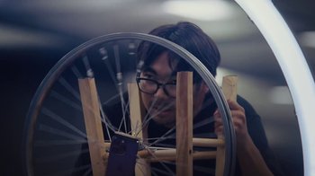 Movie still from “Apple - Chase” (2023) – Medium shot, Low angle