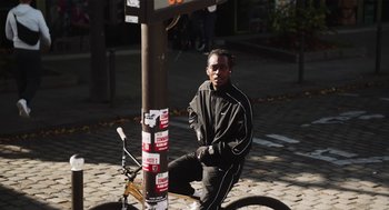 Movie still from “NIKE x SIZE? - Content De Te Revoir” (2024) – Medium shot, Low angle