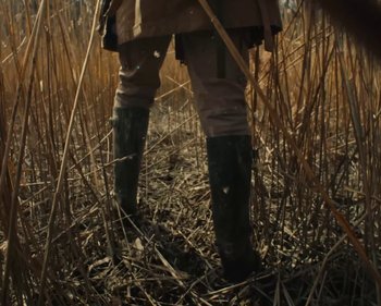 Movie still from “Nicolas Bruno - "The Fear Cycle" Film - Unveiling Sleep Paralysis Through Art” (2024) – Medium shot, Low angle