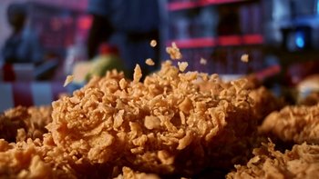 Movie still from “KFC - Crunch Collective” (2023) – Extreme Close Up shot, Overhead angle