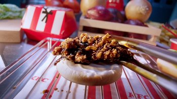 Movie still from “KFC - Crunch Collective” (2023) – Extreme Close Up shot, Overhead angle