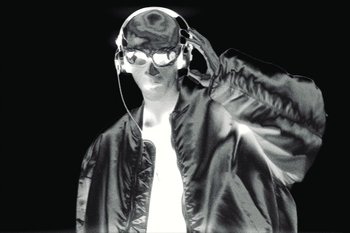 Movie still from “Alpha Industries - Made for Heroes, Worn by Icons” (2024) – Medium shot, Overhead angle