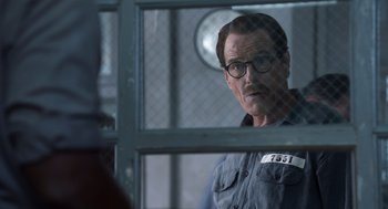 Movie still from “Trumbo” (2015), directed by Jay Roach – A man in a jail cell looking out a window; Close Up shot, Over the shoulder angle