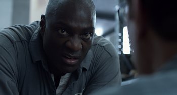 Movie still from “Trumbo” (2015), directed by Jay Roach – A man's face as he leans against a wall; Close Up shot, Low angle