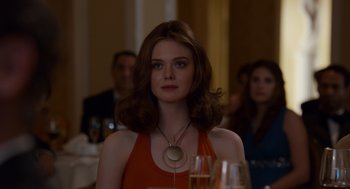 Movie still from “Trumbo” (2015), directed by Jay Roach – A woman with a necklace sitting in front of a table; Close Up shot, Over the shoulder angle