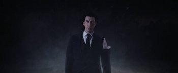 Movie still from “Squarespace - The Singularity” (2023) – Medium shot, Low angle