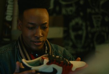 Movie still from “Trophy Room - Air Jordan "Rookie Card"” (2024) – Close Up shot, Low angle