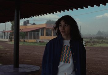 Movie still from “Oppo - Make Every Shot Stand Out” (2024) – Medium shot, Over the shoulder angle