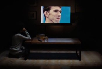 Movie still from “Omega - Road to the Olympics” (2024) – Medium shot, Over the shoulder angle