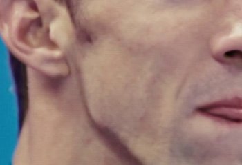 Movie still from “Omega - Road to the Olympics” (2024) – Extreme Close Up shot, Low angle