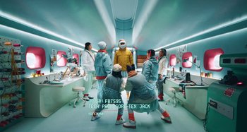 Movie still from “Nike - More Than Warmth” (2023) – Wide shot, Overhead angle