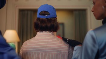 Movie still from “H&M - Hotel Hennes” (2022) – Medium shot, Over the shoulder angle