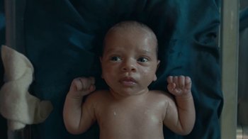 Movie still from “Huggies - Welcome to the World, Baby” (2021) – Extreme Close Up shot, High angle