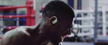 Movie still from “Beats By Dre - Unleashed” (2023) – Extreme Close Up shot, Overhead angle