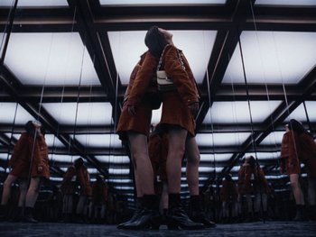 Movie still from “Coach - Life Has Different Paths” (2024) – Wide shot, Overhead angle