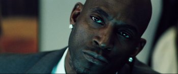 A person wearing a suit and tie