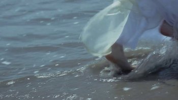 Movie still from “Katie Glasgow – “Saint”” (2021), directed by Georgia Krause – Extreme Close Up shot, Low angle