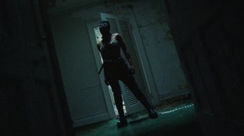 Movie still from “Abby T - Legos ft. Rodney Chrome” (2021), directed by Henry DaCosta – Wide shot, Low angle