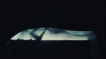 Movie still from “Abby T - Legos ft. Rodney Chrome” (2021), directed by Henry DaCosta – Extreme Wide shot, Overhead angle