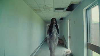 Movie still from “Abby T - Legos ft. Rodney Chrome” (2021), directed by Henry DaCosta – Wide shot, High angle