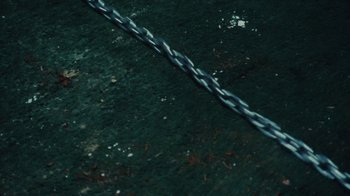 Movie still from “Abby T - Legos ft. Rodney Chrome” (2021), directed by Henry DaCosta – Extreme Close Up shot, Overhead angle