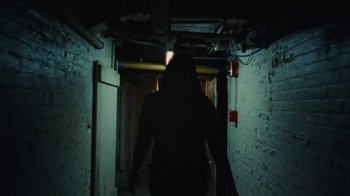 Movie still from “Abby T - Legos ft. Rodney Chrome” (2021), directed by Henry DaCosta – Wide shot, Low angle