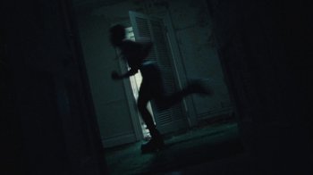 Movie still from “Abby T - Legos ft. Rodney Chrome” (2021), directed by Henry DaCosta – Wide shot, Low angle