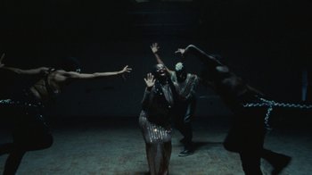 Movie still from “Abby T - Legos ft. Rodney Chrome” (2021), directed by Henry DaCosta – Medium shot, Overhead angle