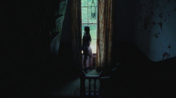 Movie still from “Abby T - Legos ft. Rodney Chrome” (2021), directed by Henry DaCosta – Wide shot, Low angle