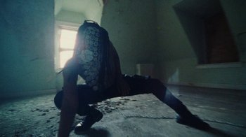 Movie still from “Abby T - Legos ft. Rodney Chrome” (2021), directed by Henry DaCosta – Wide shot, Low angle