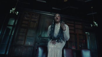 Movie still from “Abby T - Legos ft. Rodney Chrome” (2021), directed by Henry DaCosta – Medium shot, Low angle