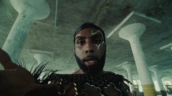 Movie still from “Abby T - Legos ft. Rodney Chrome” (2021), directed by Henry DaCosta – Close Up shot, Overhead angle