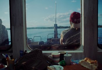 Movie still from “Stromae - Santé” (2021), directed by Jara Moravec – Medium shot, Over the shoulder angle