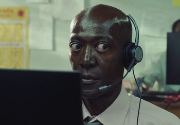 Movie still from “Stromae - Santé” (2021), directed by Jara Moravec – Close Up shot, Over the shoulder angle